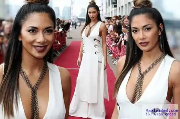 Nicole Scherzinger Displays Her Cleavage In Bizarre Creation At X Factor